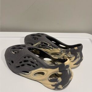 Yeezy Foam Runner Black and Cream Athletic Shoes